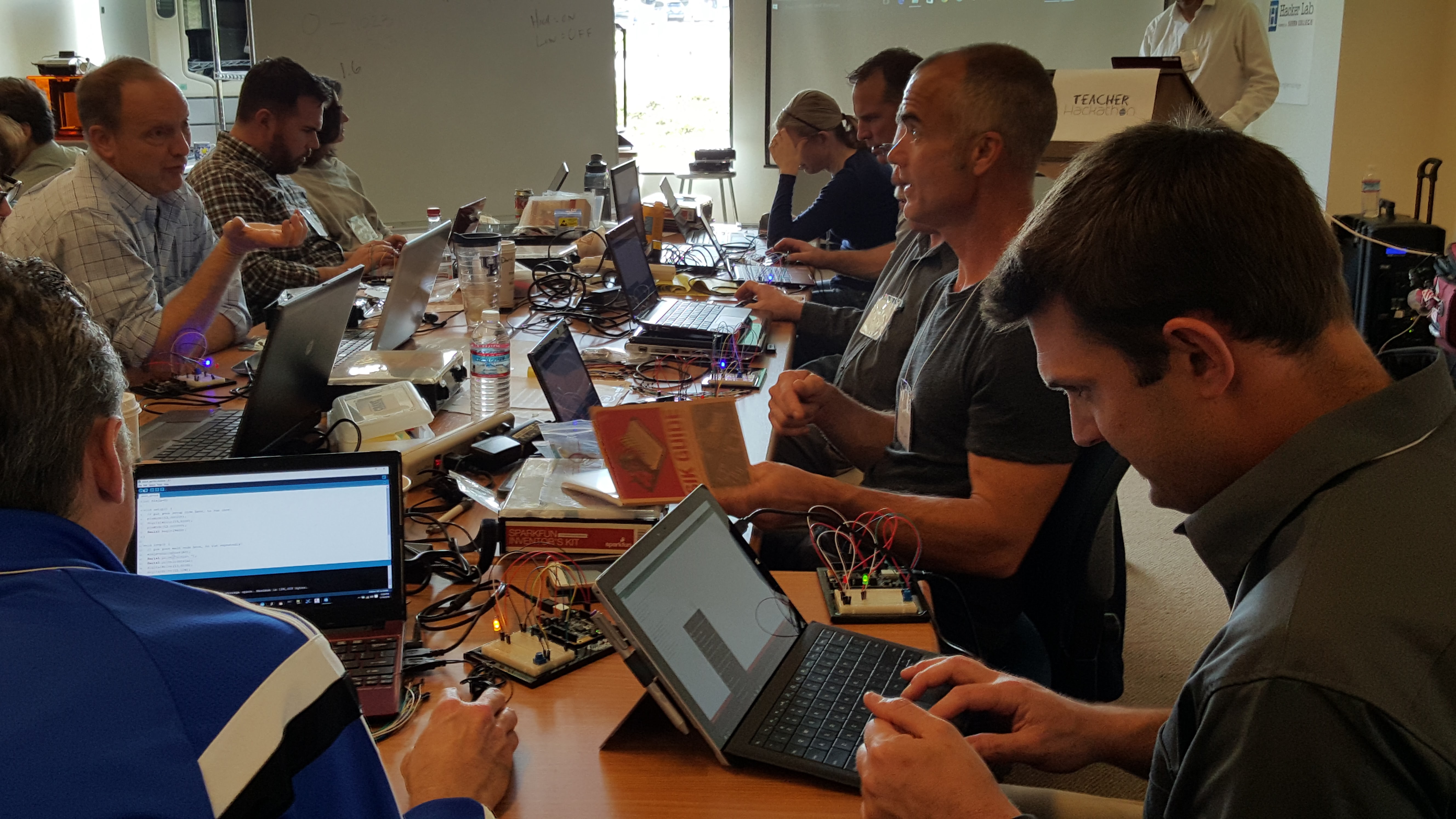 Men on computers